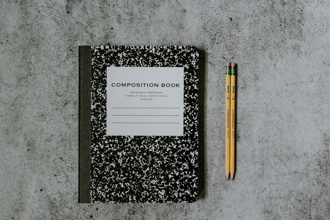 A notebook and pencils ready for language practice.